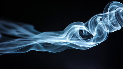 Abstract white smoke swirling elegantly against a deep black background, creating a mysterious and ethereal visual effect.