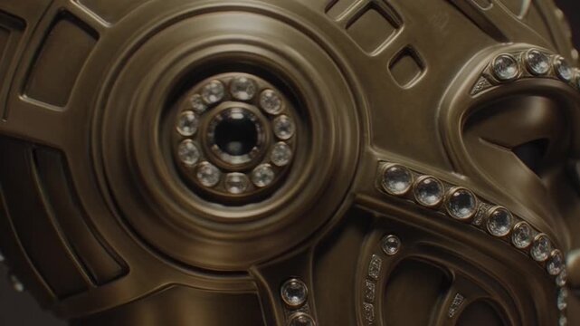 Futuristic metallic mask with gemstones