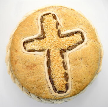 Homemade decorated Serbian slava bread isolated on white.