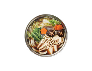 A top-down look at a Sukiyaki hot pot filled with bubbling veggies like cabbage, konjac noodles, onion, carrot, shiitake mushrooms, enokitake, and tofu swimming in Shoyu sauce soup.
