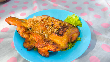 Grilled Chicken Thai Street Food Style on Plastic Plate