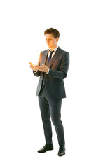 A person looking innovative holding a glowing lightbulb filament