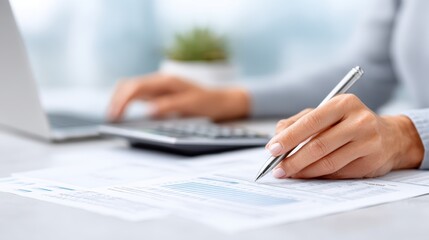 Accountant working diligently at desk with laptop, calculator, and financial documents, analyzing data and preparing reports in a professional office environment
