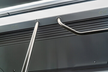 Obraz premium Metal handle in metro train