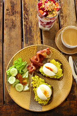 traditional breakfast with fried egg and salad