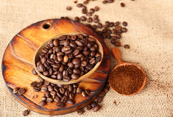 Coffee beans for delicious coffee on a wooden table