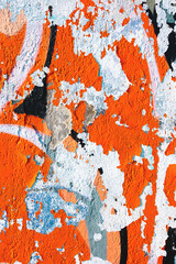 Abstract street art texture in orange, white, black with peeling paint effect. Urban, grunge style with rough surface. Background, pattern, texture, digital art, creative banner, urban visuals.