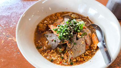 Thai Spicy Noodle Soup with Pork Balls and Glass Noodles