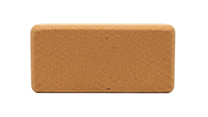 Rectangular cork yoga block with rounded edges on black