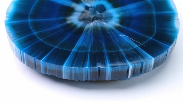 Refined Mineral Cross Section Revealing Intricate Banding With Crystalline Interior And Glossy Edges