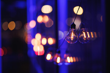 Vintage Edison bulbs with bokeh lights