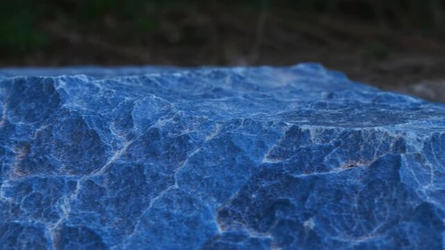 Outdoor Twilight Setting Showing Rocky Surface With Mineral Veins And Geologist Examining It Carefully