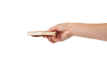 A small brown notebook in hand against a transparent background.