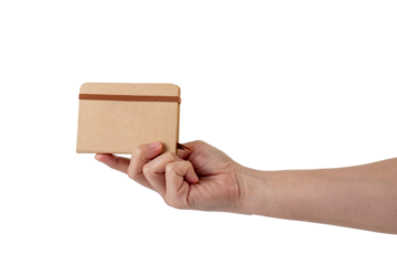 A small brown notebook in hand against a transparent background.
