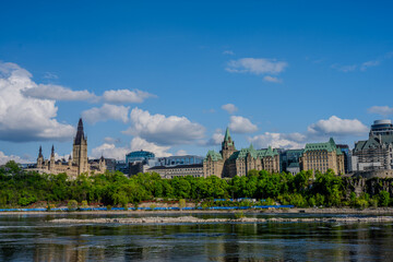 Fototapeta premium Ottawa river view of Canadian Parliament buildings and downtown skyline