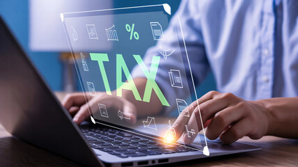 Person working on laptop with tax icons and statistics overlay