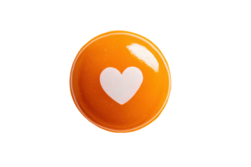 Orange sphere with white heart symbol on black background ball