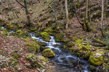 Waterfalls and Cascades of the Nera River (Cheile Nerei Beusnita) National Park, Romania. Hiking the gorge and exploring emerald pools. Romanian beauty and nature.