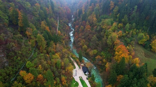 Drone aerial panorama 4k footage view  across the valley of zgornje, gorje,  village near lake bled Slovenia. Entrance to Vintgar Gorge julian alps. radovna river flowing