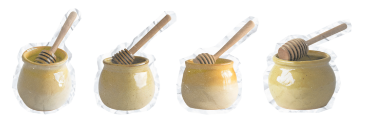 Four yellow ceramic honey pots with wooden dippers wrapped in clear plastic transparent background