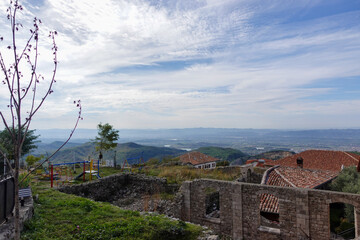 A sweeping view from Kruja Castle across the Albanian countryside, where rolling hills and open skies tell centuries of history.