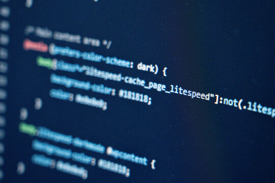 Extreme Close-Up of CSS Dark Mode Code with Vibrant Syntax Highlighting on Screen - Powered by Adobe
