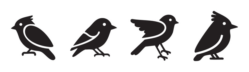 Fototapeta premium Four black bird icons with various poses and styles showcasing a collection of simple avian designs suitable for graphic elements and logos.