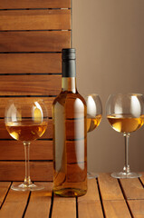 White wine on a wooden background.