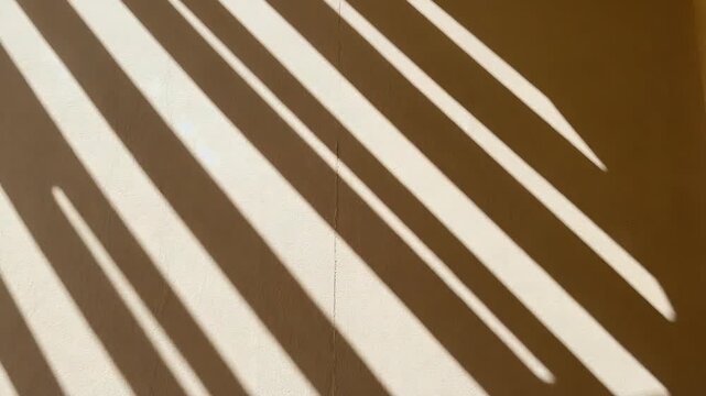 Diagonal Sunlight Shadows Creating Minimal Abstract Wall Pattern
