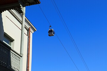 Transport, cable car cabin, funicular in Tbilisi above the houses in the old town