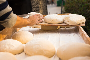 bread preparation. loaves of dough before baking