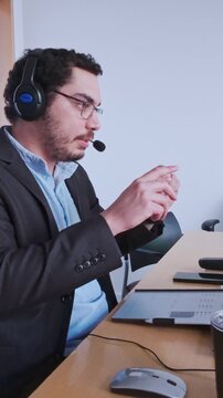 Man Pointing Emphatically to Make a Point in a Webinar.