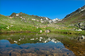 Magnificent views from G&ouml;lyayla in Rize during the spring months. Streams in the mountainous regions. Streams formed by the melting glaciers in the highlands. Livestock farming in the highlands. Color