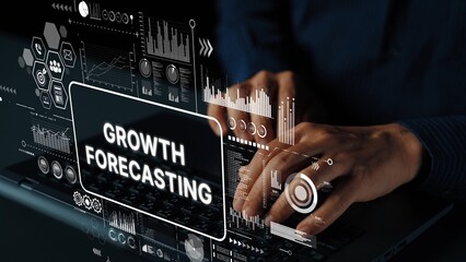 Hands Typing on Laptop with Growth Forecasting Data Visualization in a Business Concept Workspace. Asymptotic smart data analytic.