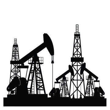Industrial landscape featuring oil rigs and pumping jacks in stark black silhouette