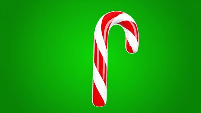 3D animation of a christmas candy cane with white stripes against a chroma key green screen background. 