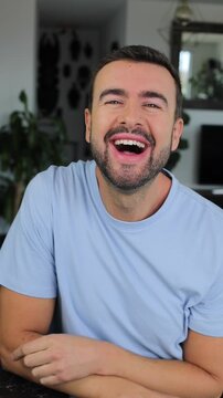 Judgy man laughing at something 