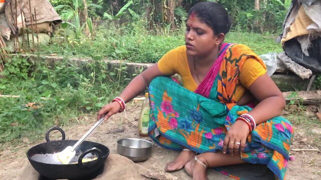 Rural Indian Woman Cooking Outdoors in Traditional Village Kitchen, Preparing Food on Wood Fire Chulha, Authentic Indian Lifestyle, Culture and Rural Life