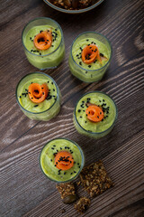 Smoked salmon shot glasses guacamole served with homemade crackers. High quality photo