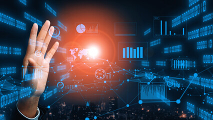 This image showcases a futuristic concept of technology, featuring a hand gesture against a backdrop of digital data, graphs, and innovative analytics for business insights. Xenic