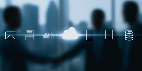 A striking composition visualizes the essence of cloud computing and data management, underscored by silhouettes of business people in a modern office.