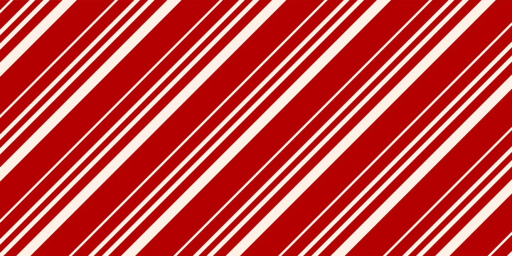 Christmas Seamless Vector Pattern. Contain candy cane stripes in red and cream colors. Great for wrapping paper and wallpapers.