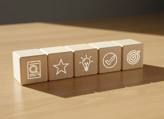 Wooden cubes illustrate problem solving strategy for business development and project management from analysis to goal.