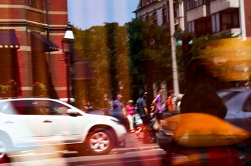 Urban Commute: Motion Blur of Moving Vehicles and Walking Pedestrians on City Street