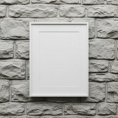 Blank white mailbox mounted on stone wall.