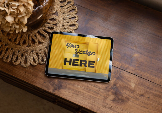 Mockup of Elegant Tablet on Wooden Table Display