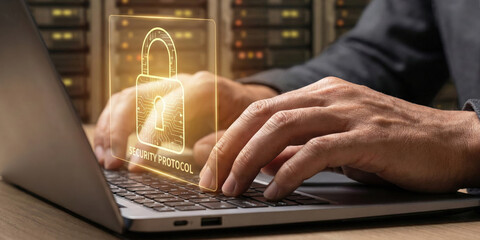 Cyber security protocol high level planning concept on laptop computer with glowing padlock hologram