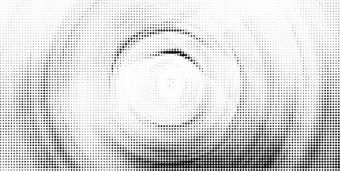 An intriguing circular form emerges from a dynamic halftone dot pattern, creating a central focal point.