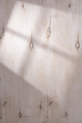 White wall background with hard shadow