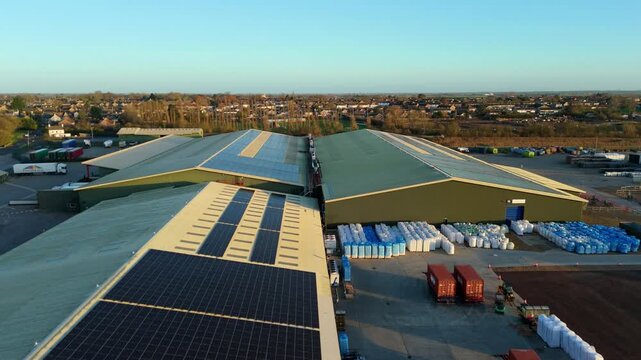 Aerial Drone View of Green Industrial Buildings Warehouses and Distribution Centres with Solar Panels and Goods Yards in Chatteris United Kingdom